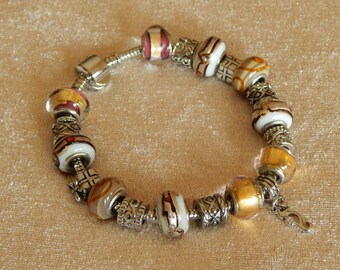 Lovely Add a Bead Bracelet in Rich Gold and Silver Tones