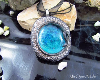 Pendant in antiqued silver with large blue stone