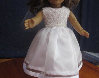 communion dress and veil will fit your 18 inch doll such as American Girl
