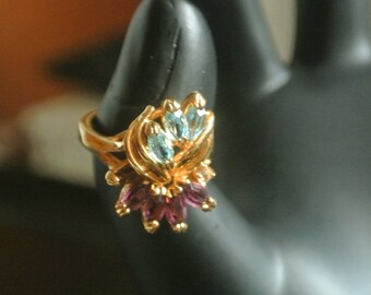 A Real Pretty Amethyst and Blue Topaz Ring