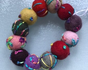 Embroidered wool felt bead bracelet