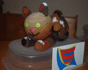 Handmade Crochet Kitty Cat Plushie. Calico with green button eyes. Playful pose and ready to pounce. Amigurumi style.