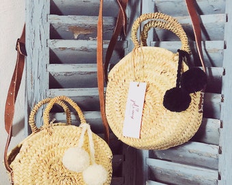 The baskets round tassels leather handles