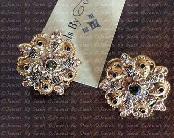 Kundan stud earrings in olive green zircon