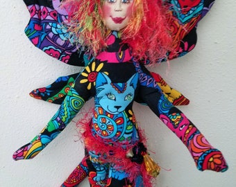 Whimsical, colorful fiber sculpted cat fairy figurine wall accent
