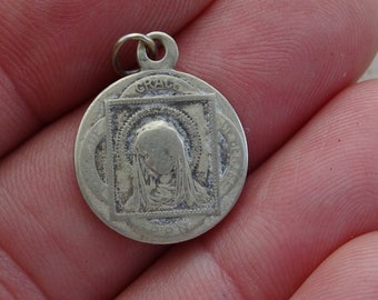 Religious antique silver ( hall marked ) catholic medal pendant Holy charm medallion of Holy Mary Our Lady of Berzee and Holy Christ. (10 Z)