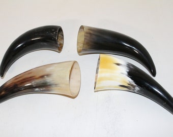 4 Cow horn tips .... e4a85 ... Natural colored, polished cow horns.,..