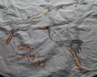 Vintage embroidered baby laundry bag