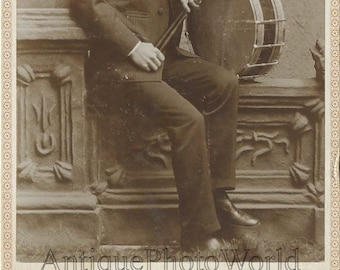 Man with drum antique cabinet photo Wisconsin