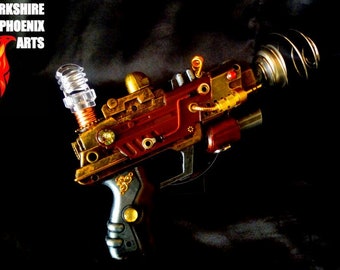 Steampunk ray gun, working battery power light, metallic colours, cables, cogs and gears, cosplay or display