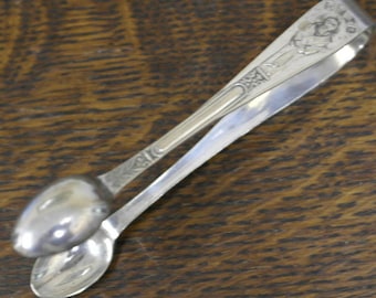 antique silver plate apostil epns sugar tongs
