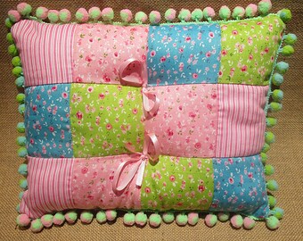 Pink blue green rectangular patchwork pillow