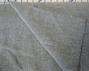 Gray nubby boucle sweater knit.