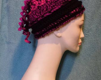 Flower applique curly cue hat