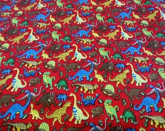 Patterns of dinosaurs red background cotton fabric