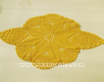 Pretty yellow oval crochet doily
