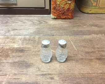Vintage salt and pepper shakers Clear glass hand grenade