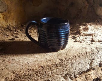One of a kind mug altered by hand