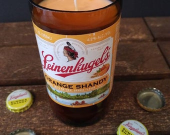 Upcycled Leinenliugel's beer bottle candle. Made with soy wax and orange essential oil. Ready to give as a gift.