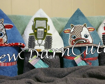 Hooded towels. Lined-embroidered-appliqued "peeker characters."