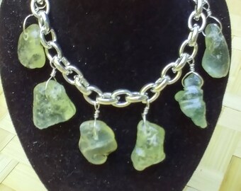 Bracelet of chunky bonfire seaglass on sterling silver.
