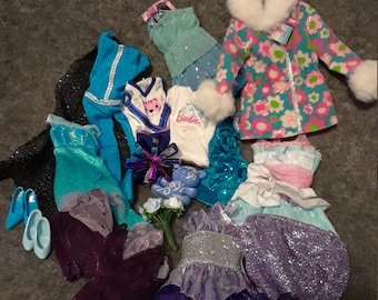 Assorted lot of cool toned Barbie clothes, jacket, dresses, bodysuit, skirts, heels tops, teddy bear