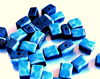 Blue triangular patterned polymer clay beads