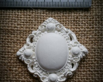 Finely crafted in raw cast Medallion