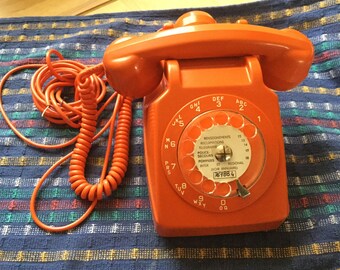 Orange vintage rotary phone