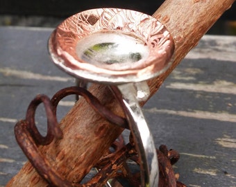 Handmade silver ring with accent of edited copper