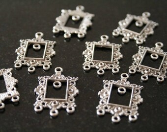 14 antique silver connectors. (ref:0954).