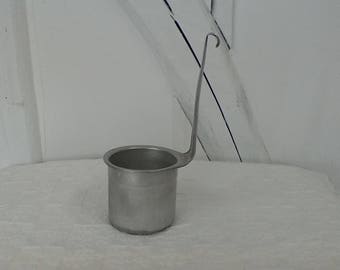 Vintage aluminum milk measure