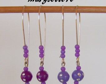 These earrings quite in lightness in purple tones