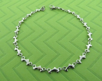 stainless steel dolphin chain anklet. avail in 9 and 10 inches