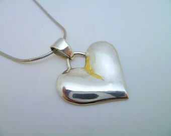 Broken Heart Pendant in Gold and Silver