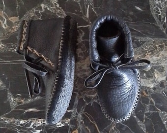 Buffalo hide moccasins lined with elkskin, with a double buffalo insole , with an additional rubber bottom