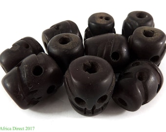 10 Tibetan Skull Beads Amber Color Resin Loose 117619
