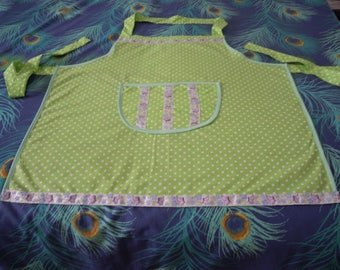 fancy apron of cooking green with white dots
