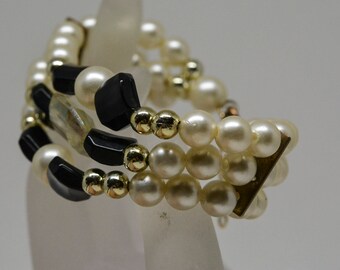 Gold tone faux pearl bracelet