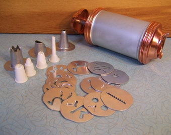 Vintage Mirro cookie press and cake decorator