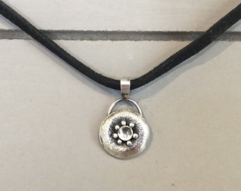 Round silver pendant, oxidized