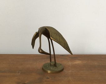 vintage brass crane. mid century paperweight brass crane. hollywood regency boho asian brass bird crane. interior design home decor