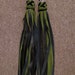 Pair of green finger floggers