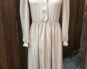 Vintage 1980s Willi of California day dress. Sand colored polka dot silky jacquard fabric.