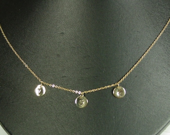 stamped initials ,1 disk in solid 14k gold , will never tarnish. with 10k solid gold chain