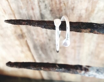 Silver ring, forged ends