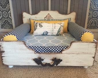 Optional log roll pillows for dog beds.