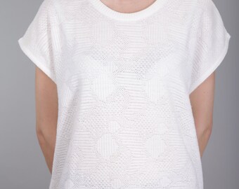 Strictly vintage knit shirt with cut sleeves