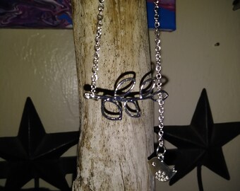 Sterling silver bird and leaf stem necklace
