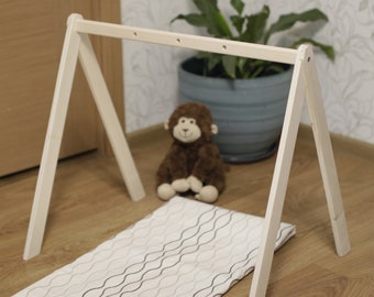 Wooden baby gym and organic baby gym toy